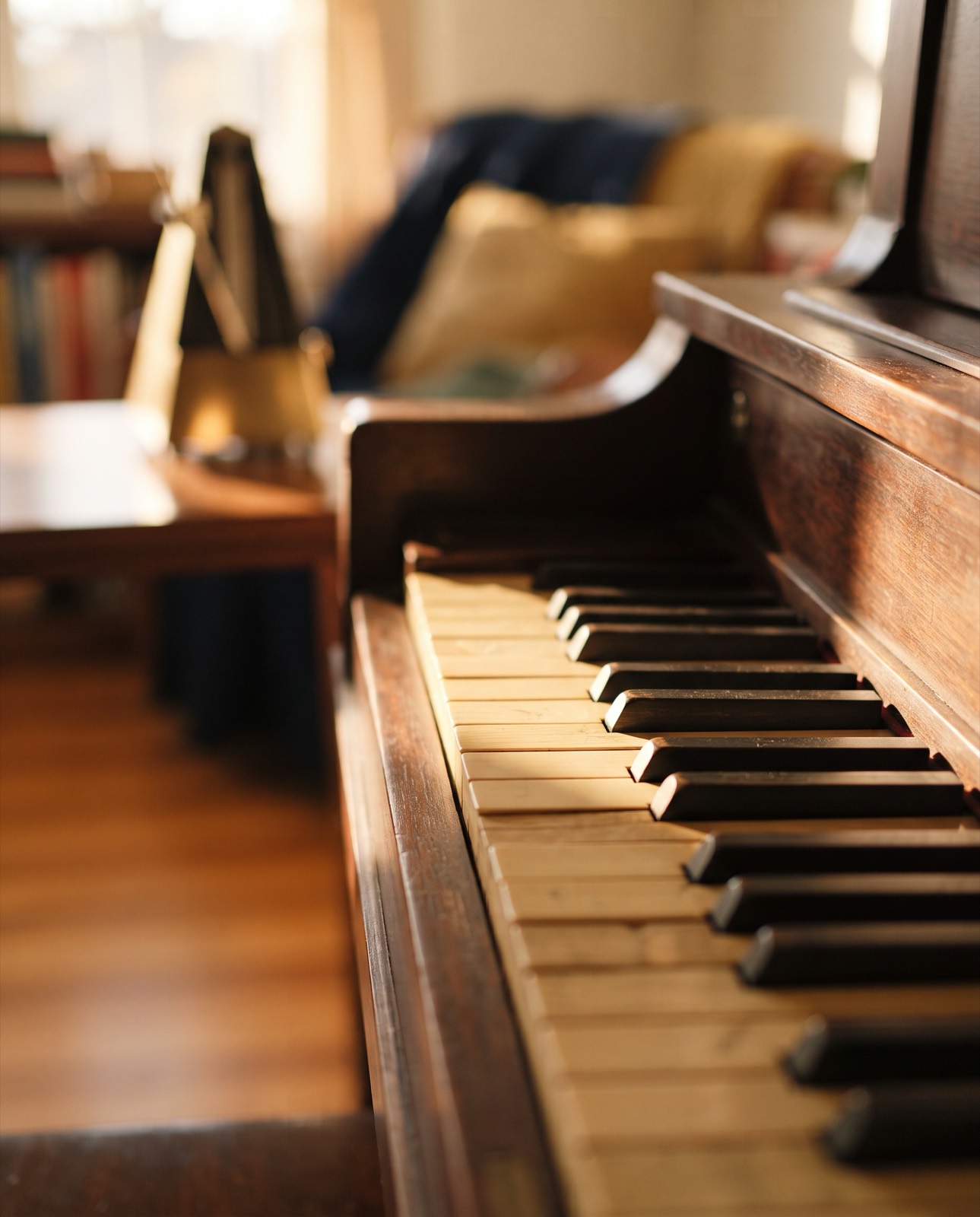 Close-up of piano keys in warm afternoon light
